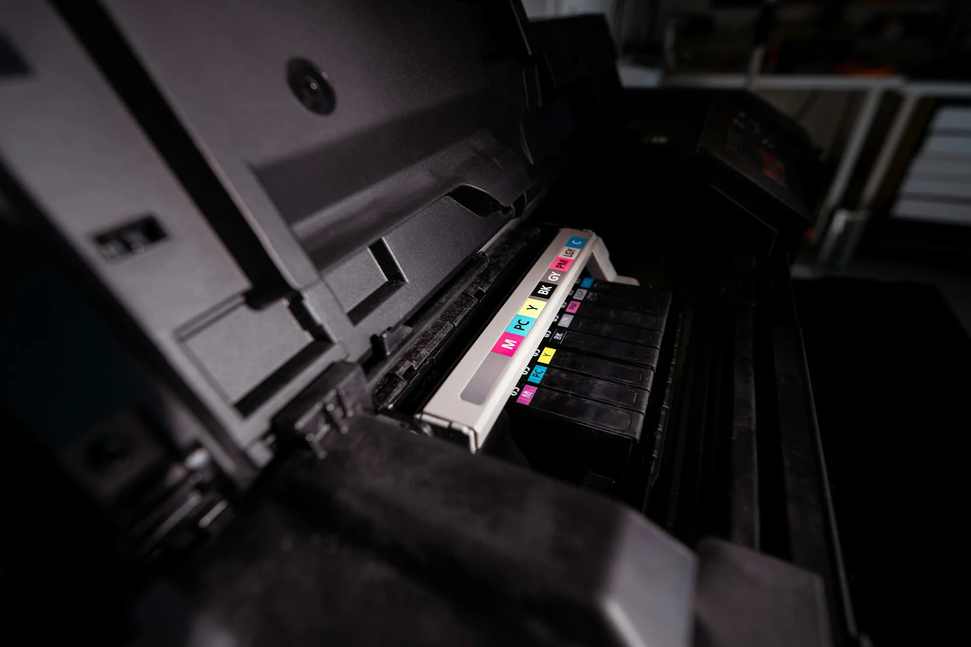 Druckwerk mit Farbpatronen für Cyan, Magenta, Gelb und Schwarz